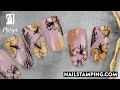 Nail art with lilies in autumn colours (nailstamping.com)
