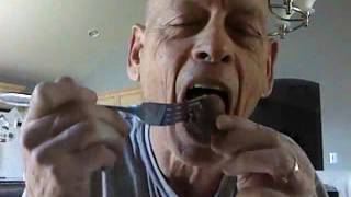 EATING A BLOOD SAUSAGE