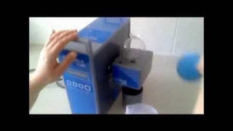 Ekomilk Scan, milk somatic cell counter: demonstration of instrument cleaning with nylon wire