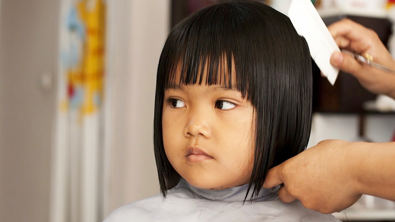 3500 Girl Cutting Hair Stock Photos Pictures  RoyaltyFree Images   iStock  Woman cutting hair Family dinner