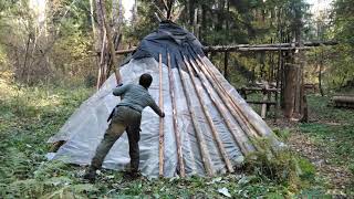 bushcraft. shelter in the forest. after the fire there was a hurricane.