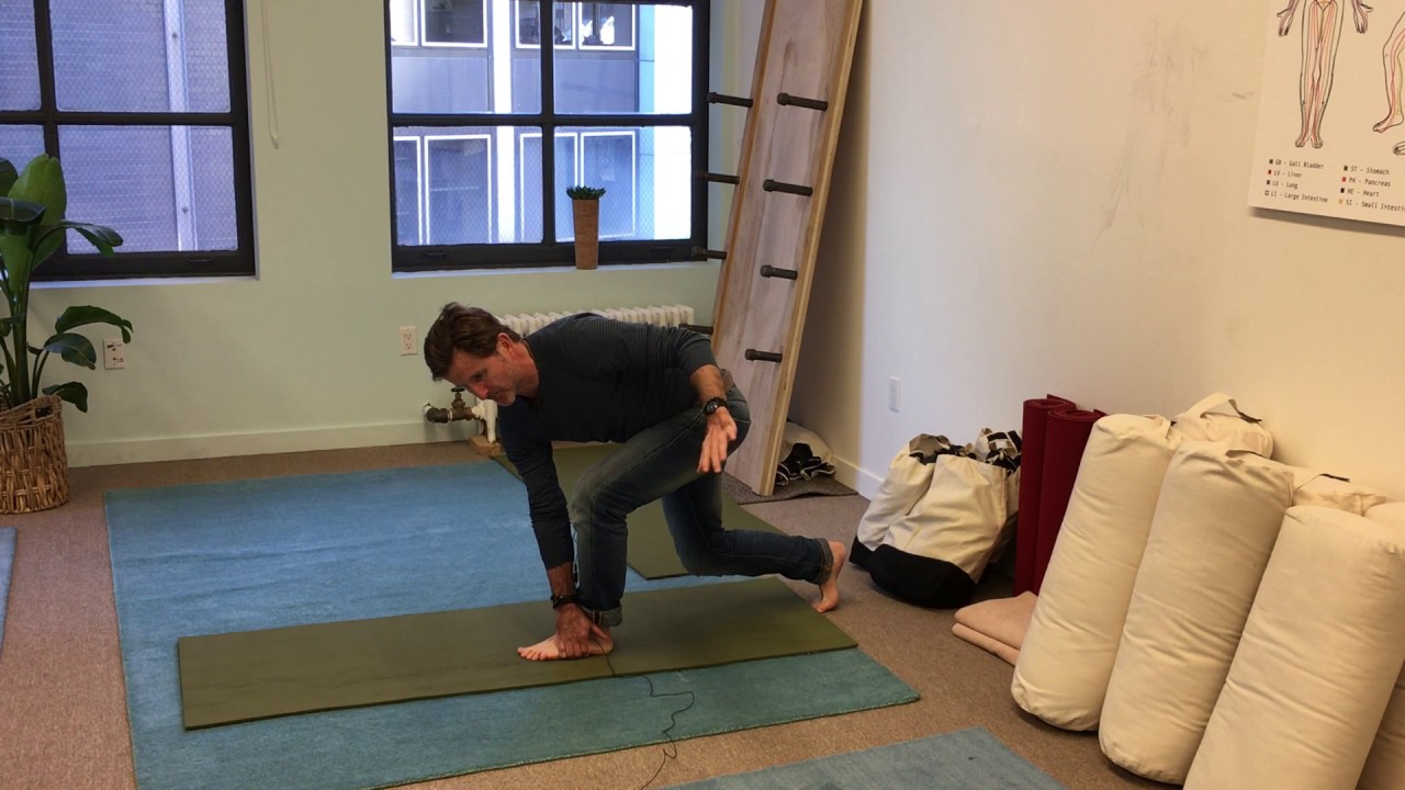 Stretch to fix low back pain and spinal compression.