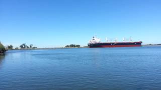 Cargo ship prop wash drags stern anchor