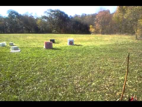 Brittney  Cooper shooting the long bow