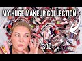 My massive makeup collection decluttering swatching and comparing every lipstick i own 300