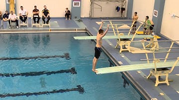 Reverse 1 1/2 somersault tuck