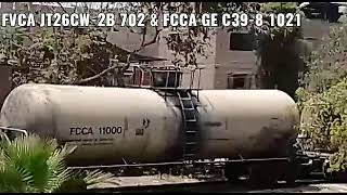 FVCA JT26CW-2B #702 & FCCA GE C39-8 #1021