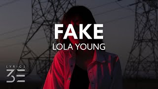 Lola Young - FAKE (Lyrics)