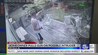 VIDEO: Homeowner pulls gun on intruder