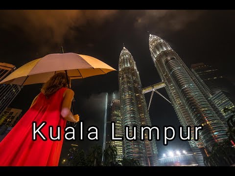 Kuala Lumpur - Petronas Towers and a Lady in Red