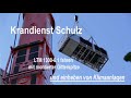 Krandienst Schulz LTM 1300-6.2 fahren mit Gitterspitze und Einhub von Klimaanlagen