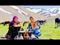 Organic mountain village life  shepherd mother cooking shepherd food in the nature  village life