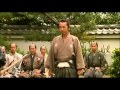 A samurai-ronin ( 浪人 ) displays his martial prowess to a local lord