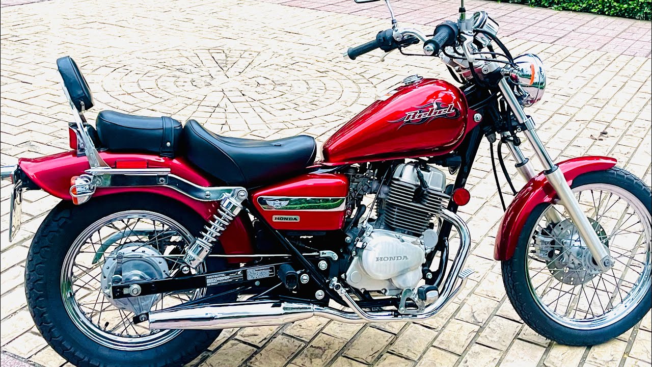 Trucmoto mới về honda rebel 250 hàng nhập Mỹ 2006 màu đỏ mận tuyệt đẹp