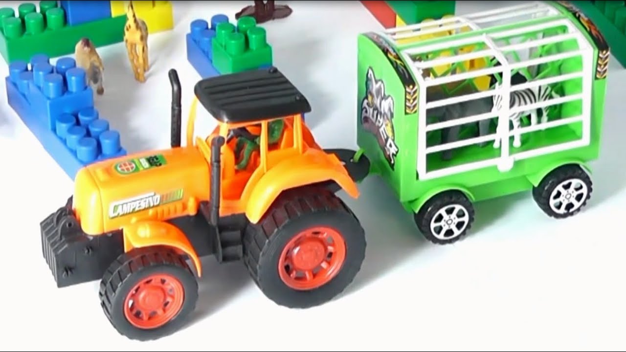 Трактор с животными игрушка. Трактор со зверями игрушка. Игрушка трактор с животными и звуками. Эвакуатор везет игрушечный трактор. Трактор домашние игры