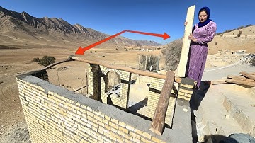 Building a wooden roof: A nomadic lady