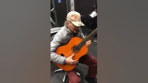 Old man plays The Good The Bad and the Ugly Theme