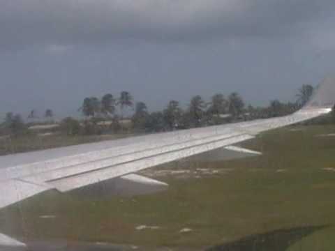 Landing at the Owen Roberts Int'l Airport in George Town, Grand Cayman, Cayman Island, B.W.I. Runway 08. Flight originated from Miami, onboard a Boeing 757-200. American Airlines. Flight was...