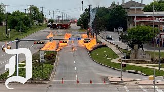 Natural gas fire burns at major intersection in Grand Prairie Texas