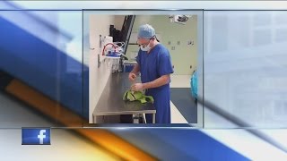 Doctor at Children's Hospital performs surgery on child and his toy