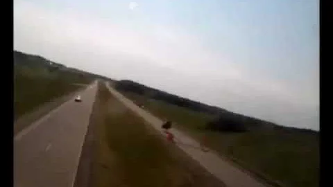 SUV hits road bump