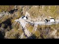 Trucks Descend marble quarries whit drone view