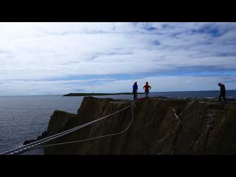 Dublin Cliffhangers doing the Tyrolean Traverse at Malin Beg with Unique Ascent - high speed Dublin Cliffhangers doing the Tyrolean Traverse at Malin Beg with Unique Ascent - high speed
