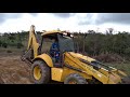 New Holland lb90 trabalhando