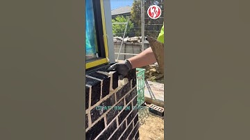 Bricklaying | Workers building a window sill