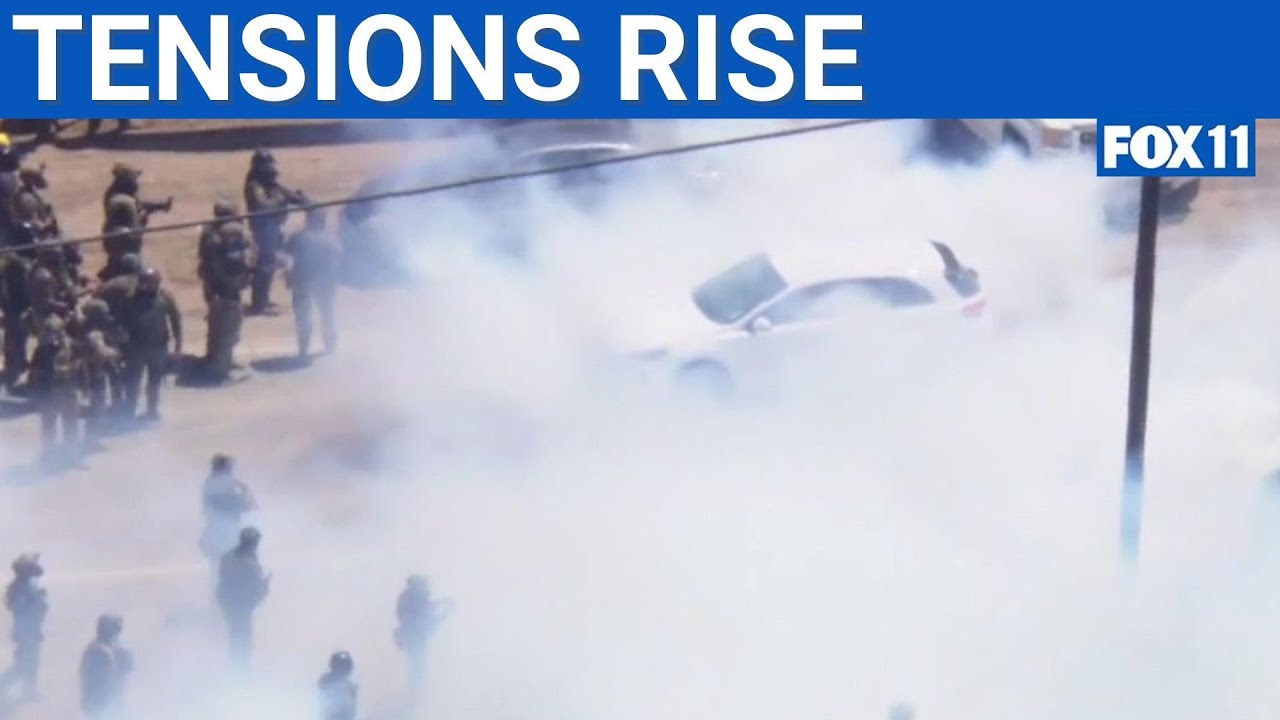 Standoff between federal agents, protesters at ICE raid as a California marijuana farm | FOX 11 LA