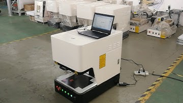 working video of mini enclosed fiber laser marking machine with full protective cover CE standard