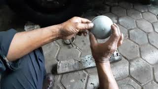 Install the front axle cover