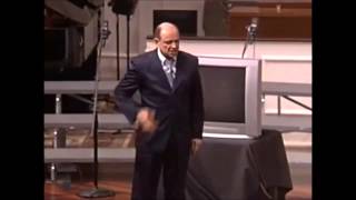 Larry Brown Smashes a Television