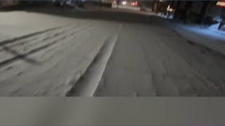 It's snow problem! Minnesota weatherman skis to work after snow falls in Duluth