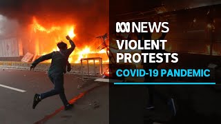 Indonesia erupts in protests for third day over controversial labour laws | ABC News