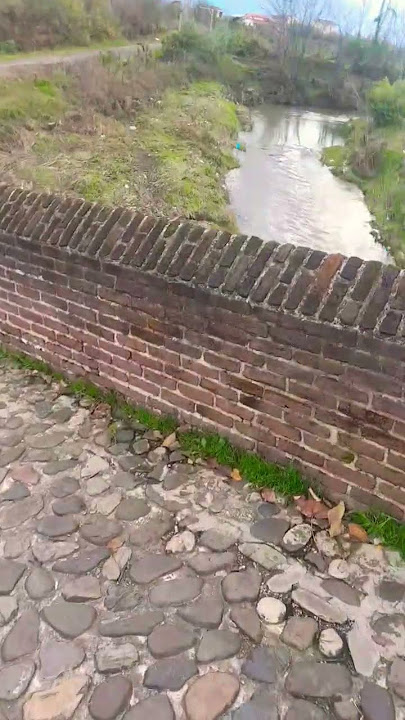 Walking on the Temijan brick bridge, which is over 700 years old.