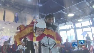 Senior citizens try indoor skydiving