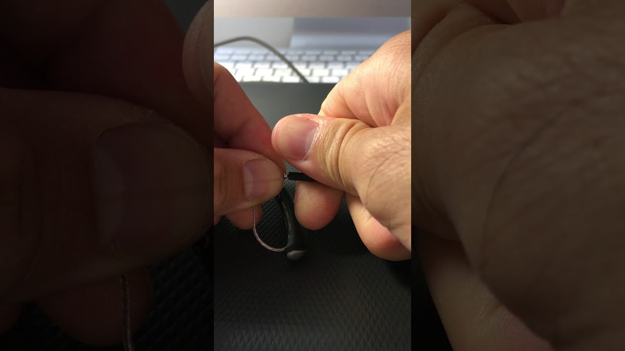 How to change hearing aid click domes and wax stops YouTube