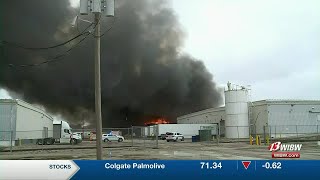Crews battle South Topeka warehouse fire