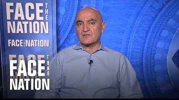 Vaccine chief Moncef Slaoui sees "light at the end of the tunnel" by spring