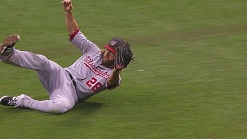 Werth makes a sliding catch in shallow right