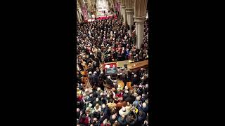 Shane MacGowan's funeral. Shane being carried out of the church.