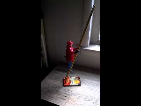 Marx Tin Wind-Up Climbing Fireman Toy