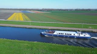 Experience the Magic of Holland in Spring: Aboard Hotel Barge Panache