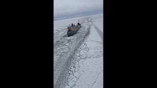 Coast Guard continue efforts to break up ice and free a freighter stuck in Lake Erie
