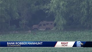 Manhunt for robbery suspect continues