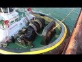 Berge Bureya, SMIT tugboats and KRVE boatmen at the Port of Rotterdam.