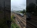 Elizabeth Line 345019 passing West Ealing Footbridge 2/9/25