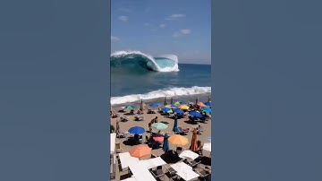 Tsunami Hits the Beach Without Warning