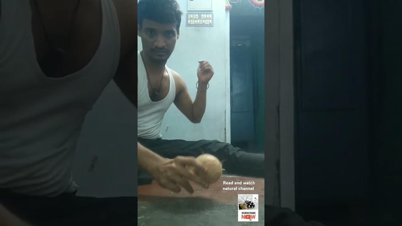 "Breaking a coconut with bare hands."